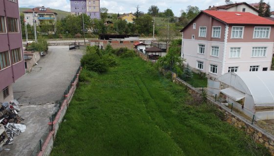 BOSTANBÜKÜ ANA YOL KENARINDA  SATILIK ARSA
